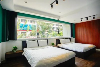 Suite Twin Room — Lá Hotel Bình Tân